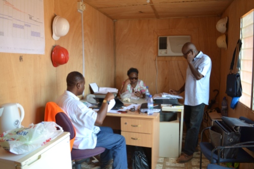 My parents & my uncle in their site office.